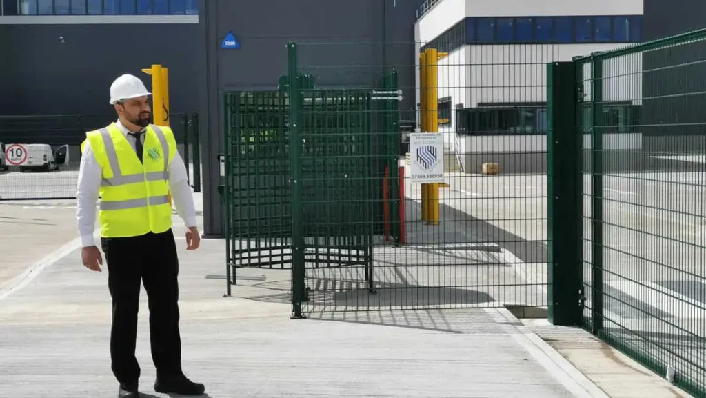 Security services Cambridgeshire MW Global Security Guard in Hi-Vis site access control.